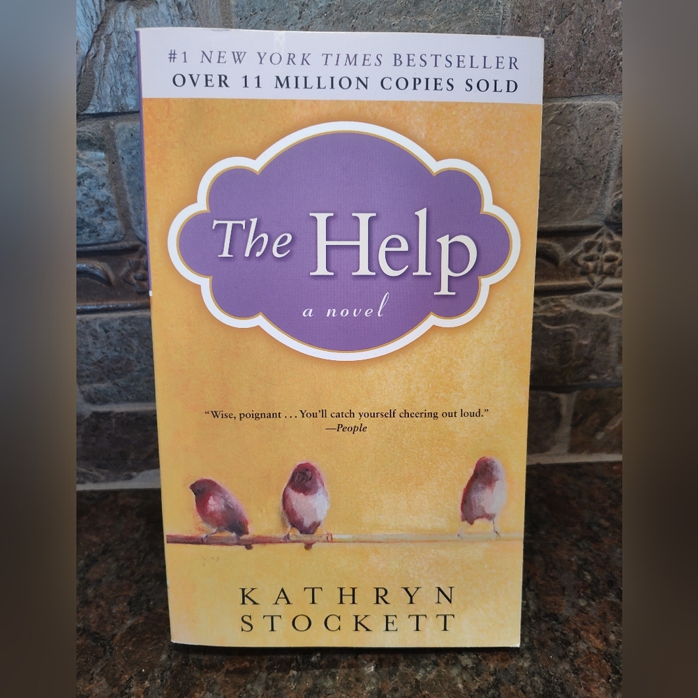 The Help by Kathryn Stockett - Yellow & Purple Paperback Novel